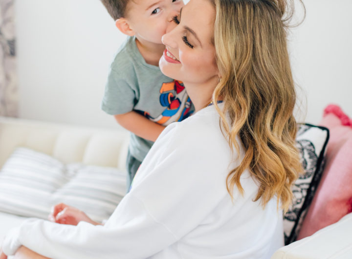 Eva Amurri Martino plays with son Major in a rainbow sweatshirt showing off her easy pretty curls