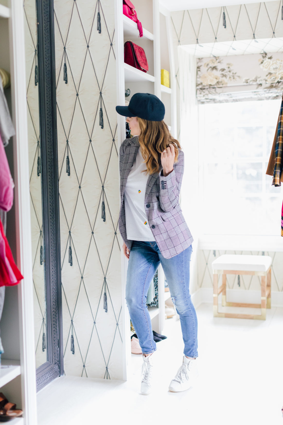 Eva Amurri Martino wears a fall blazer in her walk-in closet