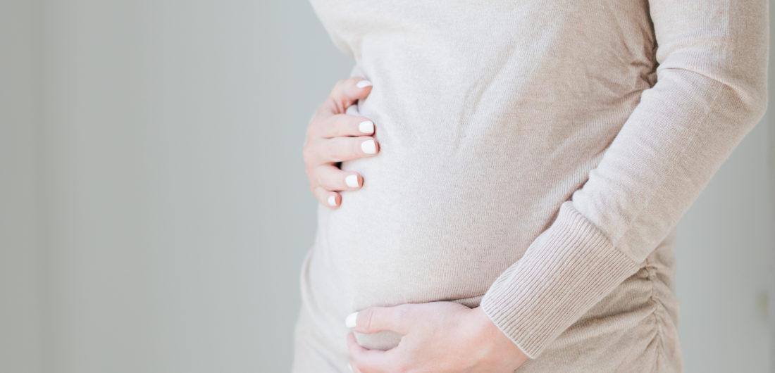Pregnant Eva Amurri Martino cradles her baby bump and gives her readers a first trimester update on her pregnancy.